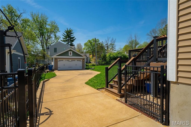 734 Fuhrmann Ter, Glendale, MO 63122 - exterior space with stairs, a garage, and an outdoor structure
