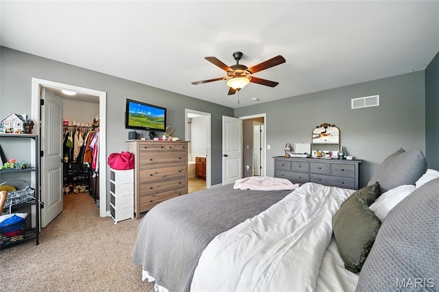 6346 Twin Springs Blvd, Cedar Hill, MO 63016 - bedroom featuring a spacious closet, a closet, light carpet, a ceiling fan, and ensuite bathroom