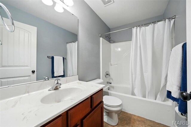 6346 Twin Springs Blvd, Cedar Hill, MO 63016 - bathroom featuring toilet, shower / bathtub combination with curtain, vanity, and stone finish floors