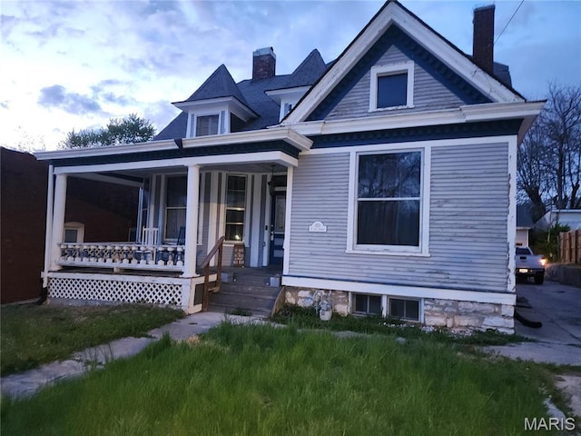 420 E 9th St, Alton, IL 62002 - view of front of property featuring a chimney and a porch