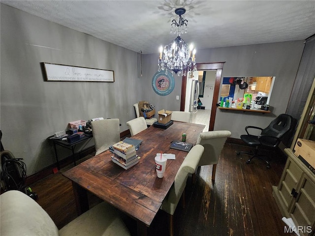 420 E 9th St, Alton, IL 62002 - dining area with hardwood / wood-style floors and a chandelier
