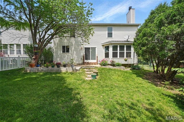 16816 Hickory Trails Ln, Wildwood, MO 63011 - back of house with a chimney
