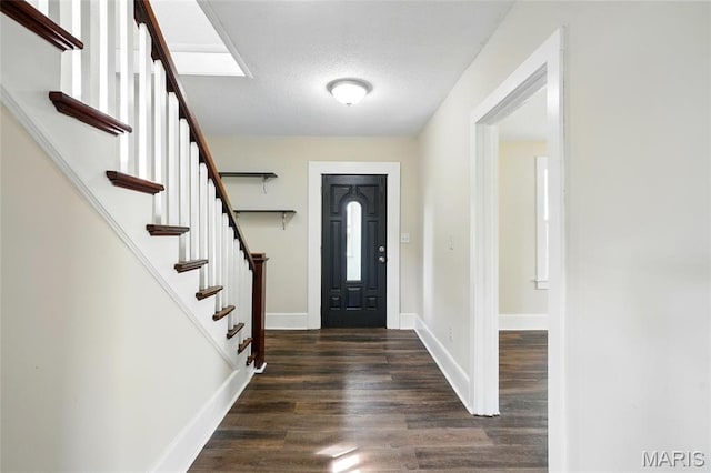 1242 Crystal Heights Rd, Crystal City, MO 63019 - entryway featuring stairway, wood finished floors, baseboards, and a textured ceiling