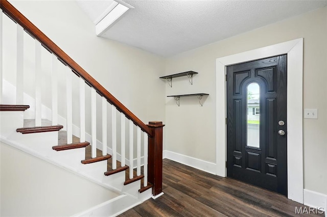1242 Crystal Heights Rd, Crystal City, MO 63019 - entryway with dark wood-style floors, stairway, baseboards, and a textured ceiling