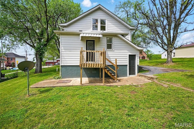 1242 Crystal Heights Rd, Crystal City, MO 63019 - rear view of house featuring a lawn