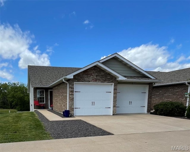7 Chester Rd, Hannibal, MO 63401 - ranch-style house with an attached garage, driveway, stone siding, a shingled roof, and a front lawn
