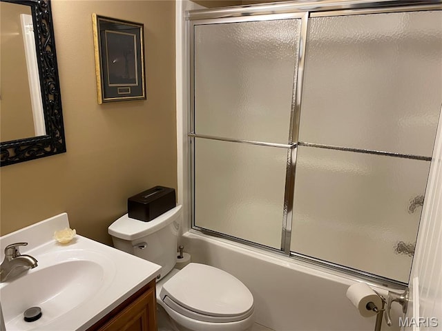 7 Chester Rd, Hannibal, MO 63401 - bathroom featuring toilet, vanity, and enclosed tub / shower combo