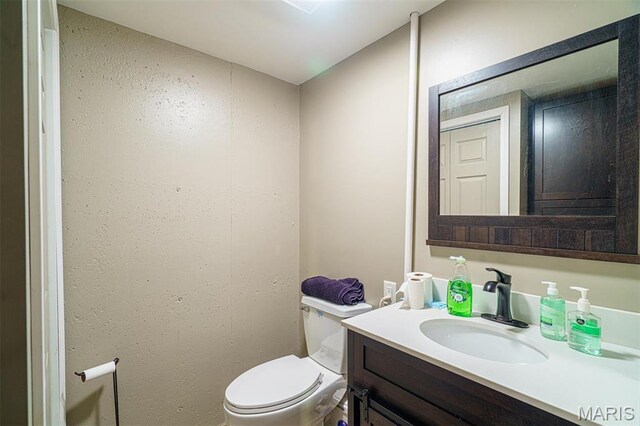 10280 County Road 3110, Rolla, MO 65401 - half bathroom featuring vanity and toilet