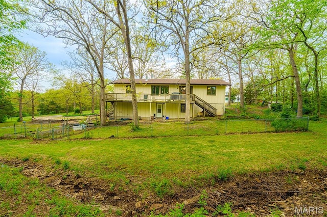 10280 County Road 3110, Rolla, MO 65401 - rear view of house with stairway and a wooden deck