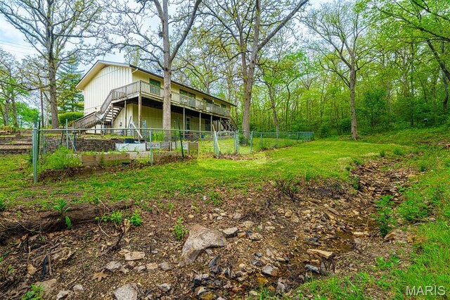 10280 County Road 3110, Rolla, MO 65401 - view of yard featuring stairs and a wooden deck