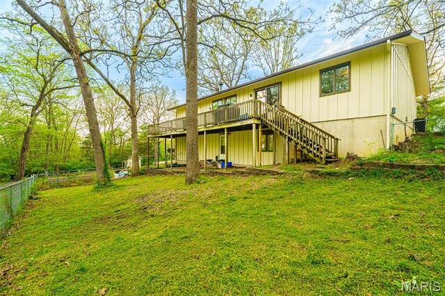 10280 County Road 3110, Rolla, MO 65401 - rear view of house featuring stairs, a deck, and board and batten siding