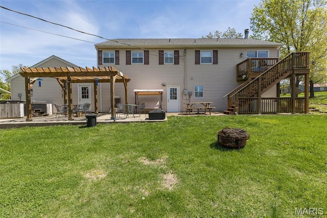 809 Cottage Rd, Bonne Terre, MO 63628 - rear view of property featuring a fire pit, a wooden deck, stairway, a patio, and a pergola