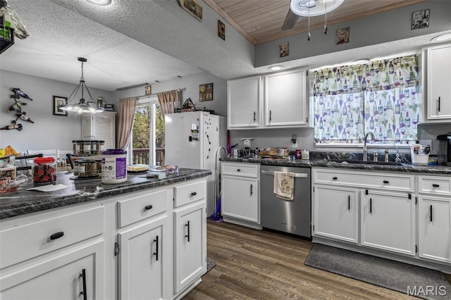 809 Cottage Rd, Bonne Terre, MO 63628 - kitchen featuring a sink, dishwasher, white cabinetry, hanging light fixtures, and a textured ceiling