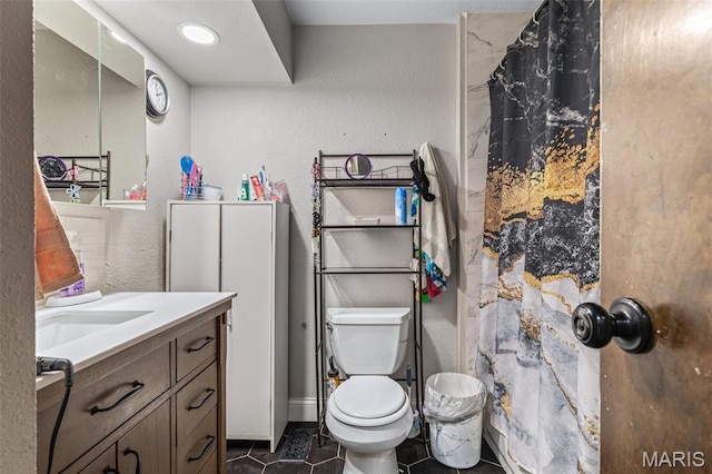 809 Cottage Rd, Bonne Terre, MO 63628 - bathroom with tile patterned floors, a textured wall, toilet, curtained shower, and vanity
