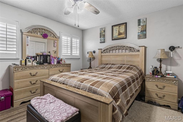 809 Cottage Rd, Bonne Terre, MO 63628 - bedroom with a textured ceiling and a ceiling fan