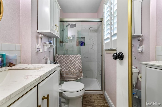 809 Cottage Rd, Bonne Terre, MO 63628 - bathroom with toilet, vanity, a shower stall, and a textured wall