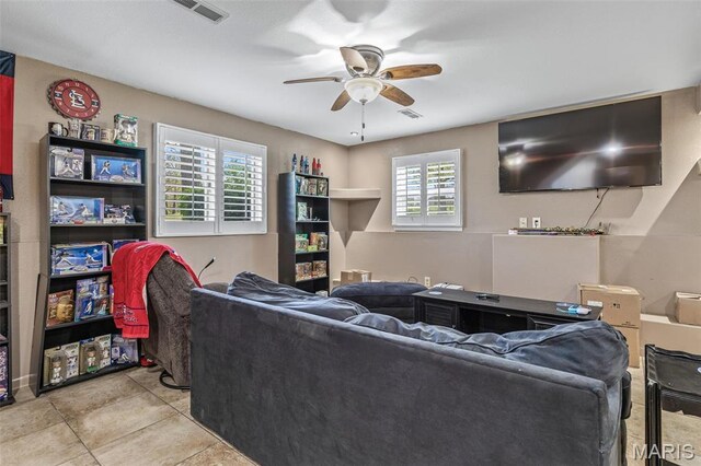 809 Cottage Rd, Bonne Terre, MO 63628 - living room featuring ceiling fan and tile patterned floors