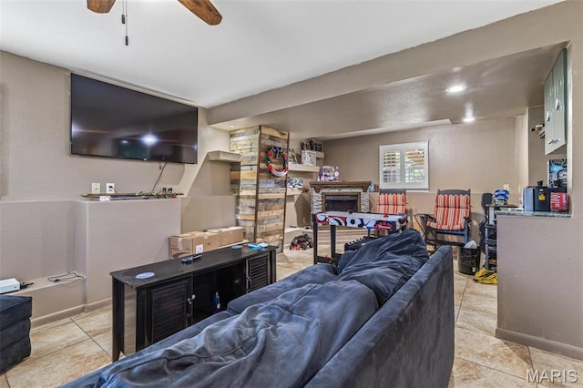 809 Cottage Rd, Bonne Terre, MO 63628 - tiled living room with a fireplace and ceiling fan