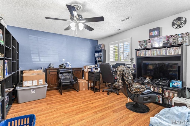 809 Cottage Rd, Bonne Terre, MO 63628 - office space featuring a textured ceiling, wood finished floors, and ceiling fan