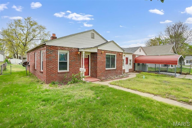 225 Whitelaw Ave, East Alton, IL 62024 - view of front facade featuring brick siding and a chimney
