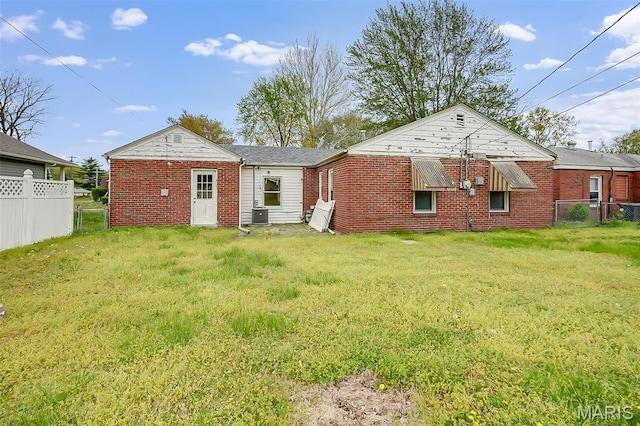 225 Whitelaw Ave, East Alton, IL 62024 - rear view of property with brick siding and central air condition unit