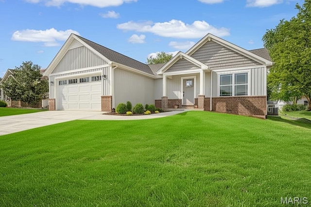 craftsman inspired home with brick siding, an attached garage, a front lawn, and board and batten siding
