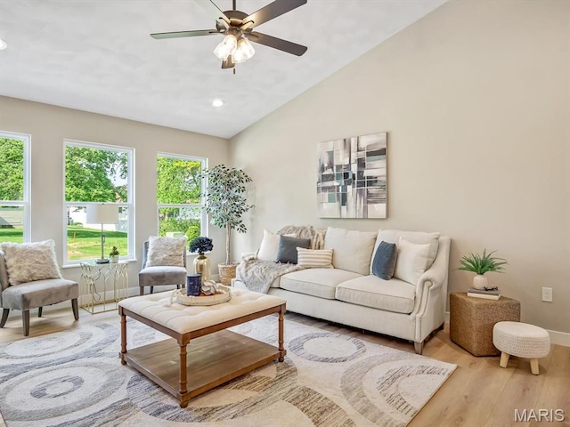 living room featuring wood finished floors, vaulted ceiling, ceiling fan, recessed lighting, and baseboards