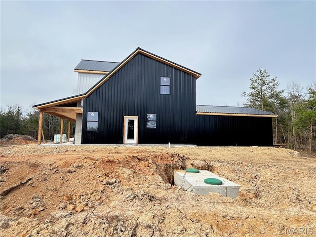 1311 County Road 4180, Salem, MO 65560 - view of side of property featuring metal roof and board and batten siding