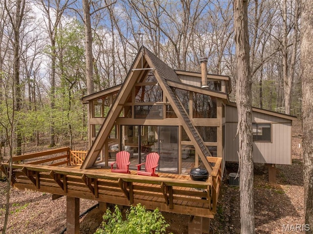 1556 Bliss Lake Dr, Innsbrook, MO 63390 - rear view of property with a deck