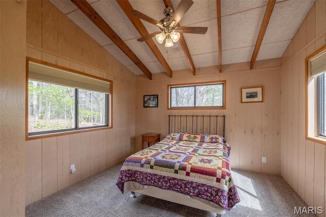 1556 Bliss Lake Dr, Innsbrook, MO 63390 - carpeted bedroom with wooden walls and ceiling fan