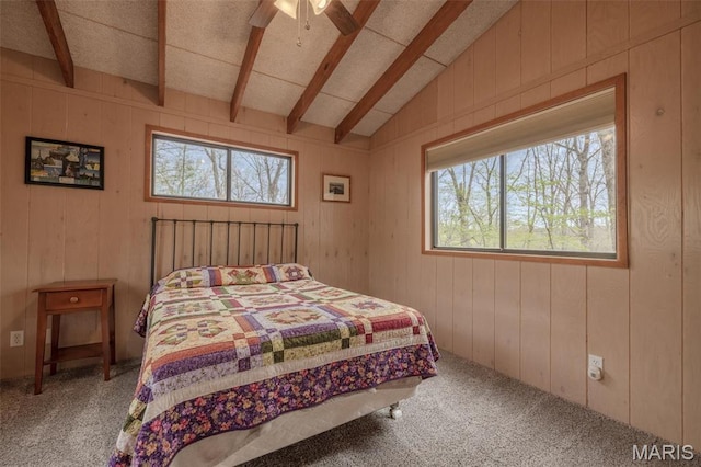 1556 Bliss Lake Dr, Innsbrook, MO 63390 - bedroom featuring multiple windows, carpet flooring, wooden walls, and ceiling fan