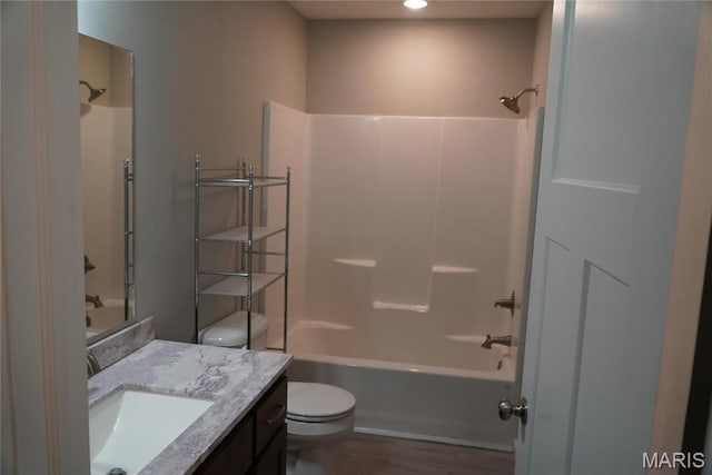 468 Polk St, Lebanon, MO 65536 - full bathroom with toilet, shower / bathtub combination, vanity, wood finished floors, and recessed lighting