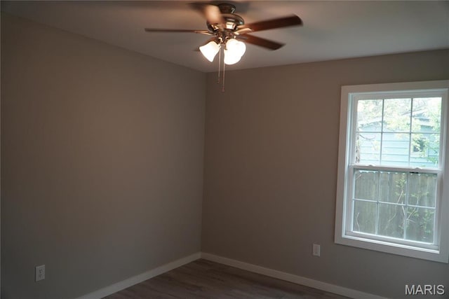 468 Polk St, Lebanon, MO 65536 - spare room featuring ceiling fan, wood finished floors, and baseboards