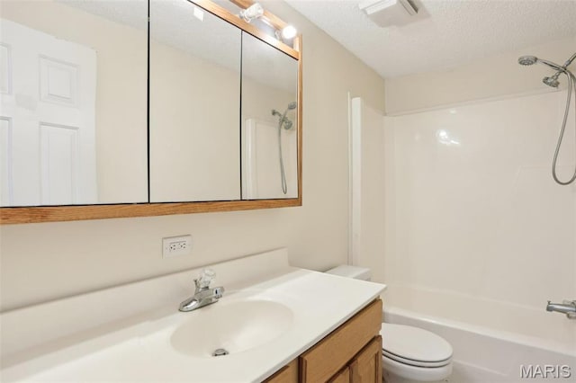21839 Dove Ln, Carlyle, IL 62231 - full bath with a textured ceiling, vanity, toilet, and shower / bathtub combination
