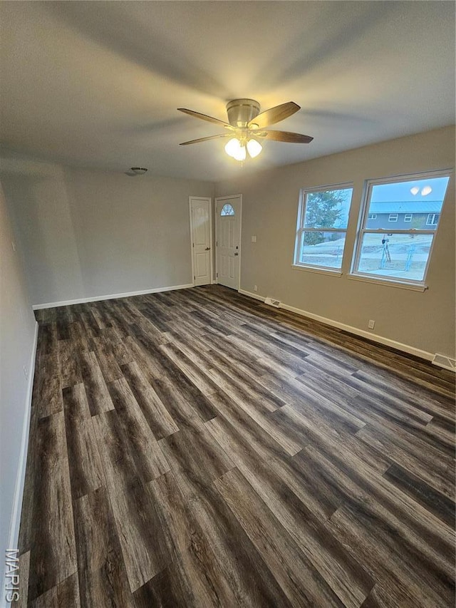 103 Eckardt Ln, Hillsboro, MO 63050 - spare room with dark wood-style flooring, baseboards, and a ceiling fan