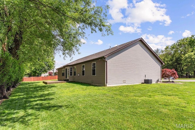 rear view of property featuring cooling unit