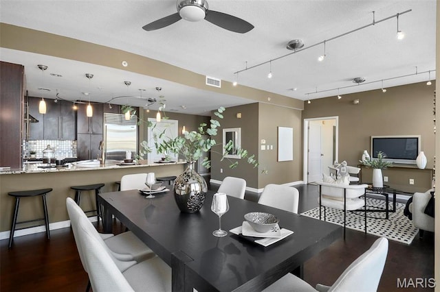 4909 Laclede Ave Unit 805, Saint Louis, MO 63108 - dining room featuring wood finished floors and a ceiling fan