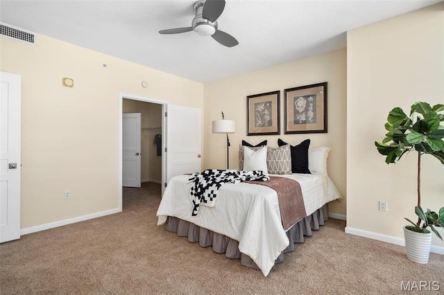 4909 Laclede Ave Unit 805, Saint Louis, MO 63108 - bedroom featuring light colored carpet, baseboards, and a ceiling fan