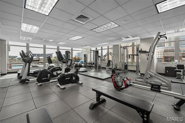 4909 Laclede Ave Unit 805, Saint Louis, MO 63108 - exercise room with a wall of windows and a drop ceiling