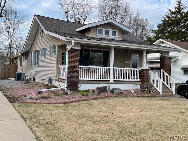 3548 Aberdeen Ave, Alton, IL 62002 - bungalow-style house with covered porch, a shingled roof, and brick siding