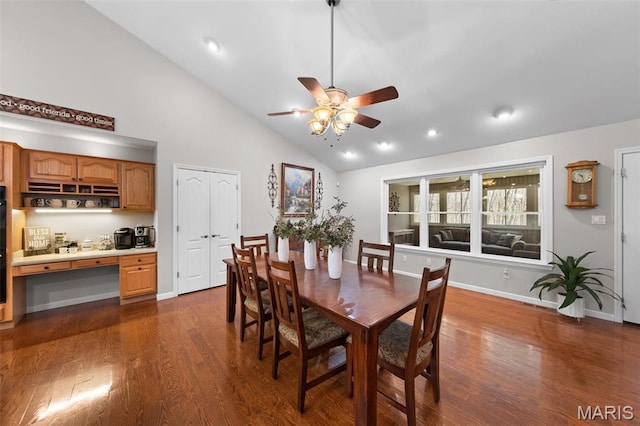 dining area with a ceiling fan, dark wood-style flooring, high vaulted ceiling, baseboards, and recessed lighting