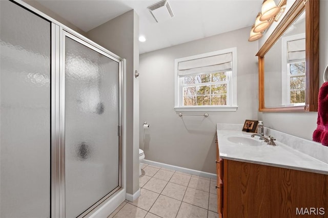 full bath with baseboards, vanity, tile patterned floors, and plenty of natural light