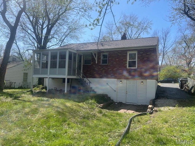 212 S Marguerite, Ferguson, MO 63135 - rear view of property with a sunroom, stairs, a yard, brick siding, and a shingled roof