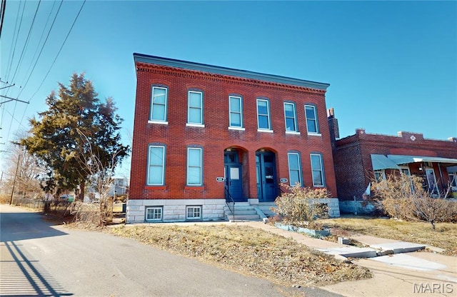 multi unit property featuring brick siding