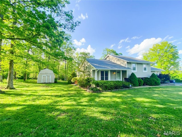 19113 Bent Oak Dr, Warrenton, MO 63383 - view of front facade with a shed and a front lawn
