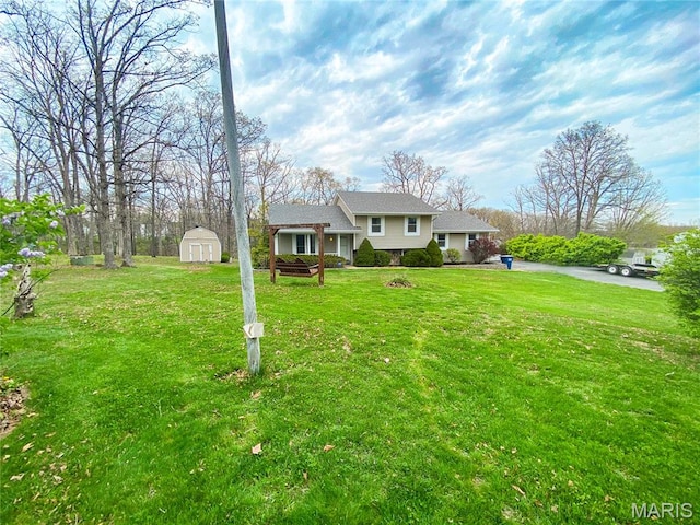 19113 Bent Oak Dr, Warrenton, MO 63383 - split level home with a storage unit and a front yard