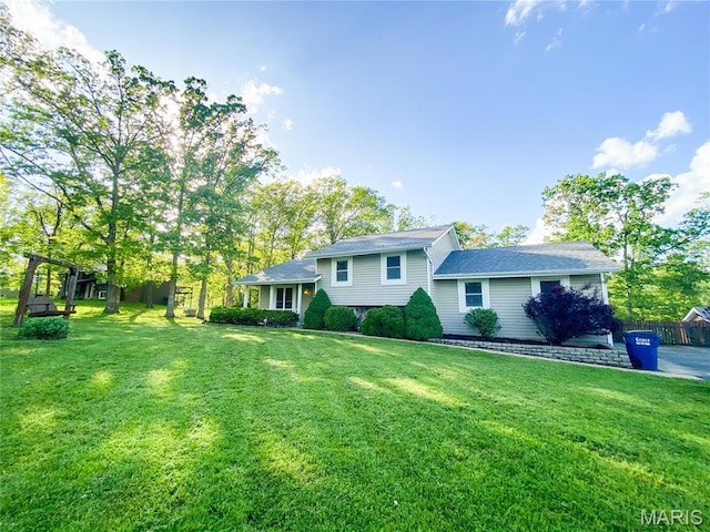 19113 Bent Oak Dr, Warrenton, MO 63383 - tri-level home with a front lawn