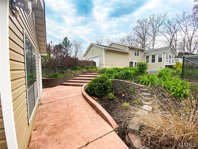 19113 Bent Oak Dr, Warrenton, MO 63383 - view of yard with a patio area