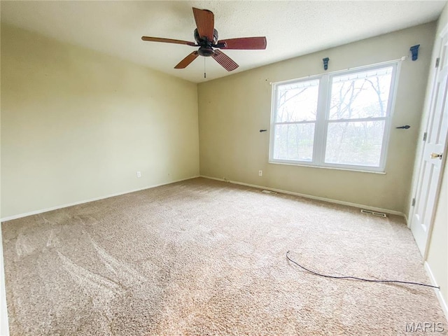 19113 Bent Oak Dr, Warrenton, MO 63383 - carpeted empty room featuring ceiling fan and baseboards