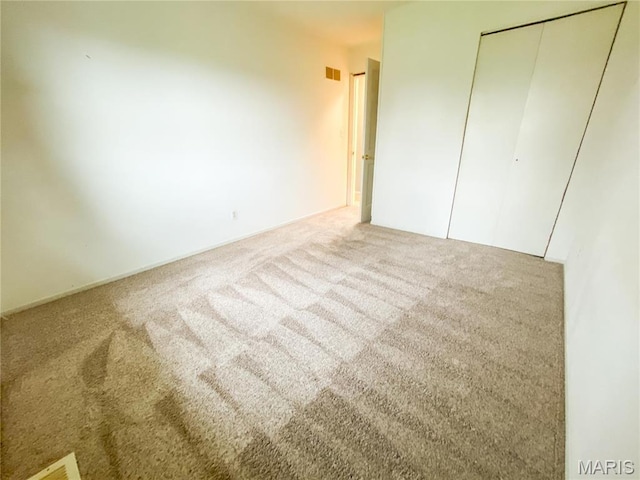19113 Bent Oak Dr, Warrenton, MO 63383 - unfurnished bedroom featuring carpet floors and a closet
